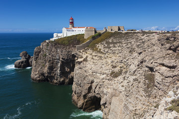 Fototapeta na wymiar Lighthouse at Cabo de Sao Vicente, Sagres, Algarve, Portugal