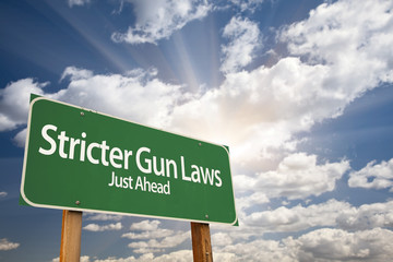 Stricter Gun Laws Green Road Sign Over Clouds
