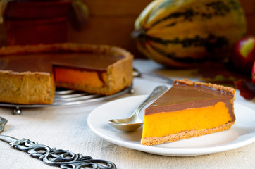 Homemade pumpkin pie with chocolate topping