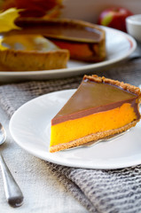 Homemade pumpkin pie with chocolate topping