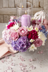 Floral arrangement with roses, peonies and hortensias.