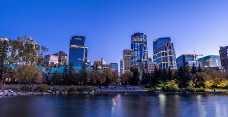 Fototapeta na wymiar Calgary skyline along the Bow River at night. 