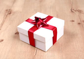 Christmas gift box on a wooden table