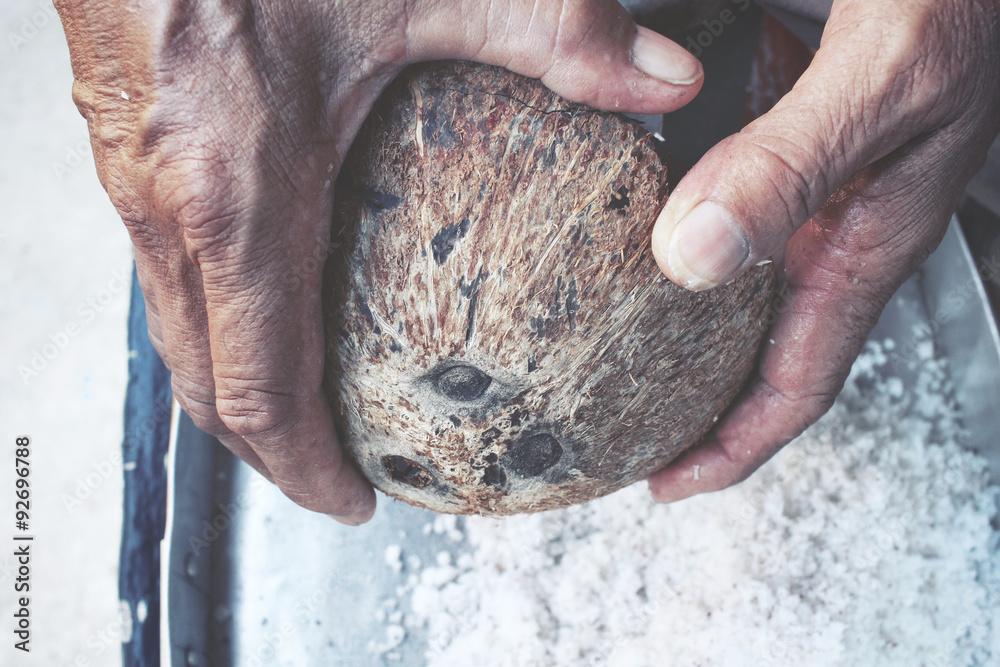 Wall mural coconut with hands