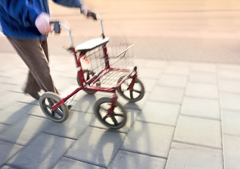 senior citizen with walking frame