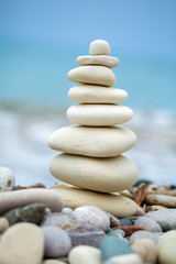 Pyramid of Stones near Sea on Beach
