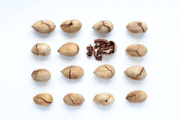 Group of nuts with one broken isolated