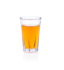 Whiskey in a shot glass isolated on a white background