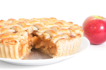 homemade apple pie with apple on white background