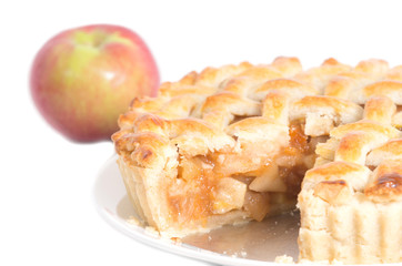 homemade apple pie with apple on white background