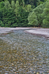Mountain river with pebble and stones