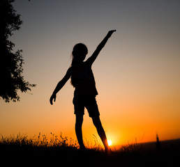 silhouette of a  teen girl 