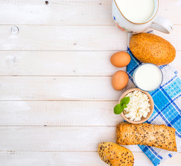 Breakfast of cheese, milk, bread and eggs 