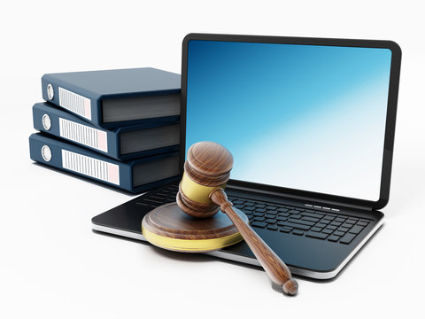 Laptop computer, gavel and folders