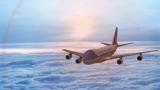 Пассажирский авиалайнер пролетает над облаками