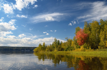 Landscape colorful autumn forest lake river sky clouds