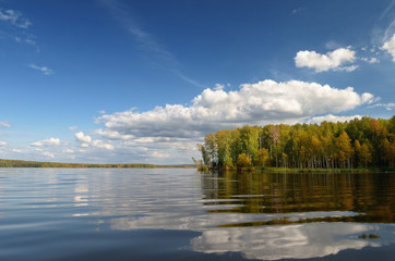 Obraz na płótnie Canvas Landscape colorful autumn forest lake river sky clouds