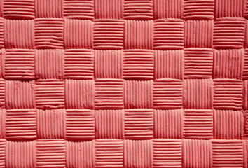 Pseudo woven pink wall background