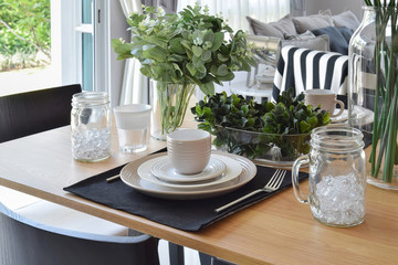 elegant table set in modern style dining room interior