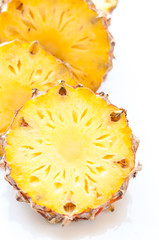 Pineapple slices isolated on white background