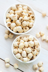 Dried lotus seeds on white background