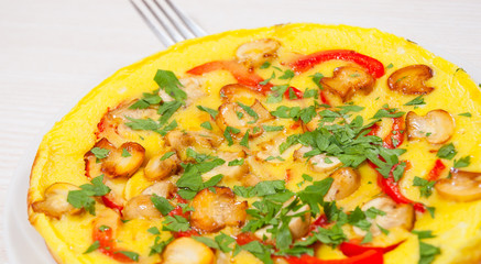 omelet with mushrooms, and vegetables