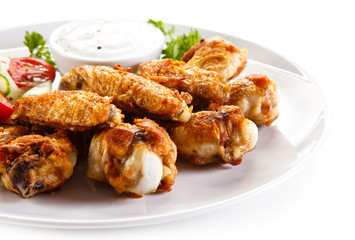 Grilled chicken wings and vegetables 