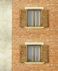 House with brick wall  and windows