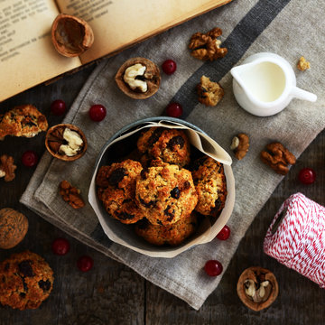 Homemade oatmeal cookies with nuts, raisin and dried cranberries, square