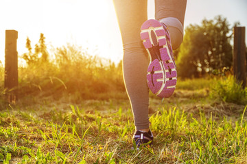 Woman running in a field