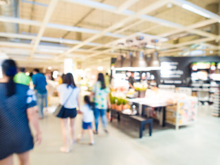 Fototapeta na wymiar Blurred image of people shopping at mall of home decor