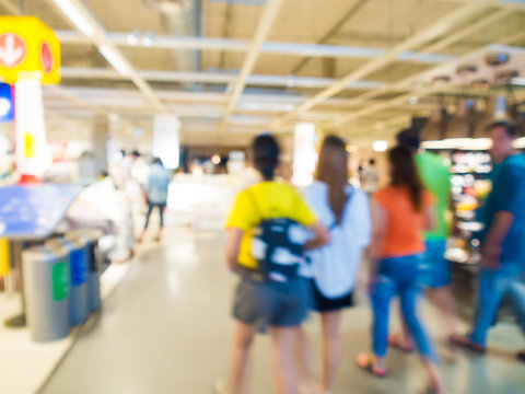 Blurred image of people shopping at mall of home decor