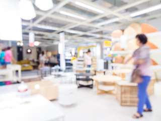 Blurred image of people shopping at mall of home decor