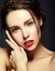 glamour portrait of beautiful  woman model lady with fresh daily makeup with red lips and clean face and romantic wavy hairstyle.