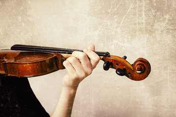 classical music Violin is in the hands of professional violinist. Vintage style