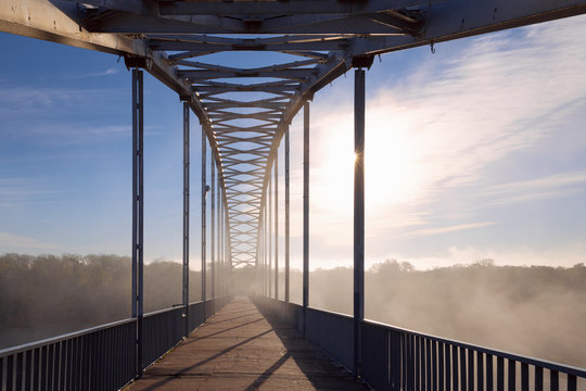 Fototapeta Gomel - October 1: footbridge in the morning mist