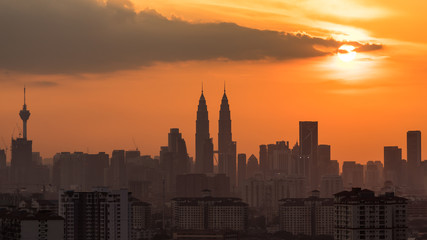 Fototapeta na wymiar KUALA LUMPUR, MALAYSIA - 16TH NOVEMBER 2014; Kuala Lumpur, the capital of Malaysia, or KL by locals. Its modern skyline is dominated by the 451m-tall KLCC, a pair of glass-and-steel-clad skyscrapers.