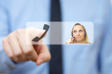 Businessman pressing dial  button on a touch screen with operato