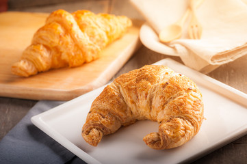 Croissant on wood table