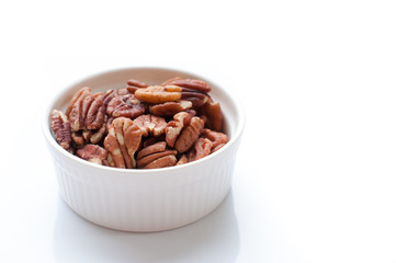 pecan nuts in ramekin bowl