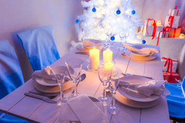 Gorgeous Christmas table setting with Christmas tree