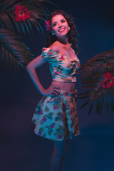 Tropical Flower Dress Pin-up Girl in Evening Light with Palm Lea