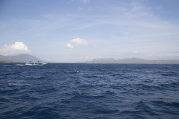 boat on an ocean coast in bali Indonesia