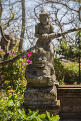 Fototapeta na wymiar Stone sculpture on entrance door of temple