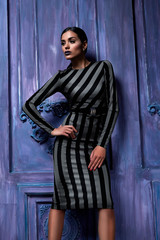 Beautiful sexy young business woman hair evening makeup wearing dress suit top high heels shoes...
