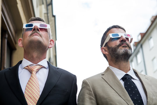 two businessmen with 3d glasses