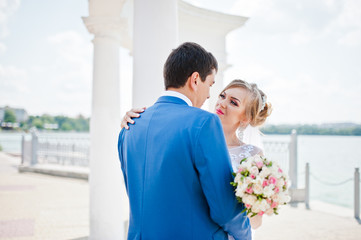 newlywed near the lake at sunny day