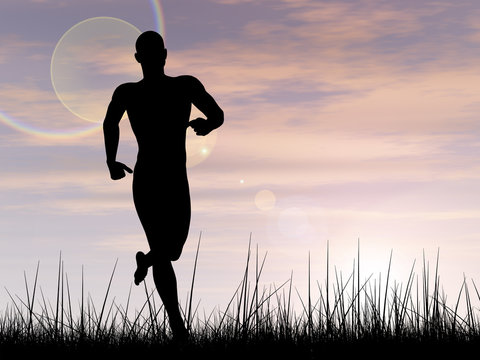Conceptual man running in grass at sunset
