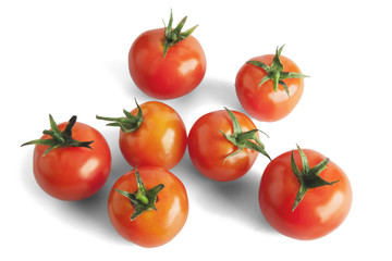 Red cherry tomatoes isolated on white.