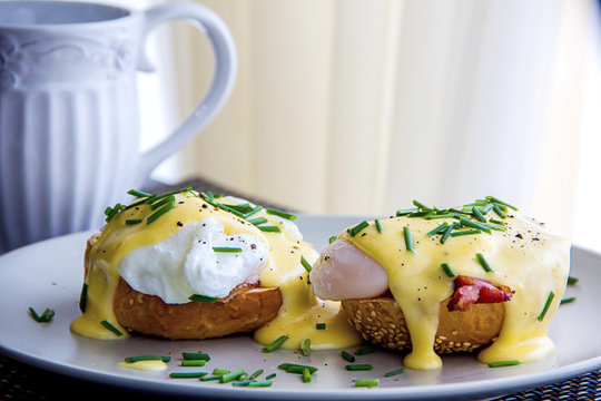 Eggs Benedict- toasted muffins, ham, poached eggs, and delicious buttery hollandaise sauce